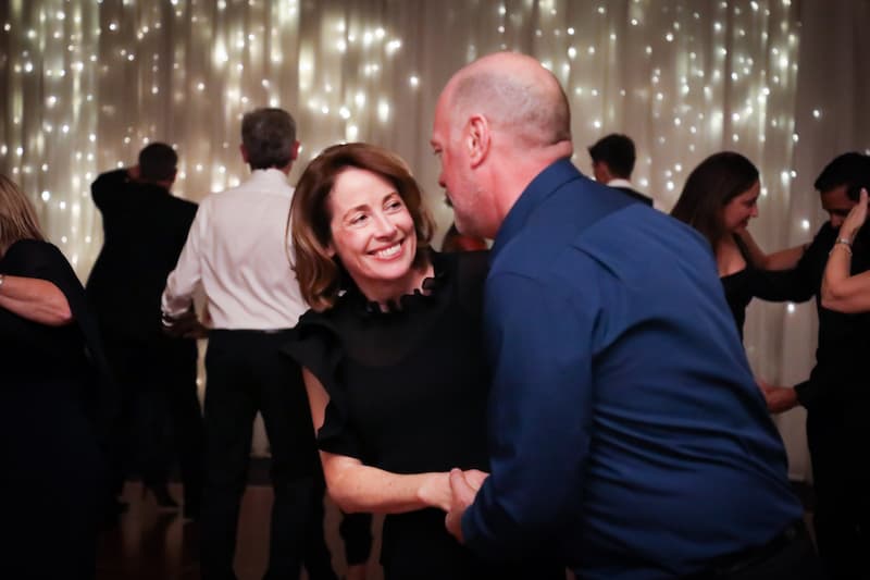 Couple dancing together in the kitchen