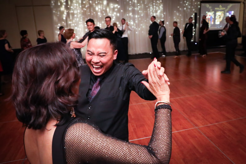 Group Class of Singles dancing together